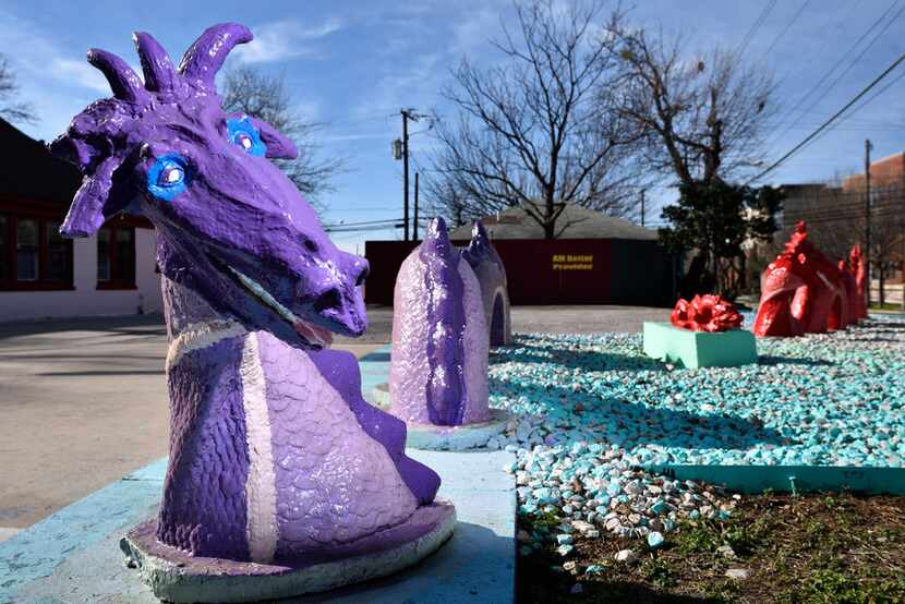 Dr. Steven Tutt's dragons outside of his office at Cedar Springs Chiropractic in Dallas on...