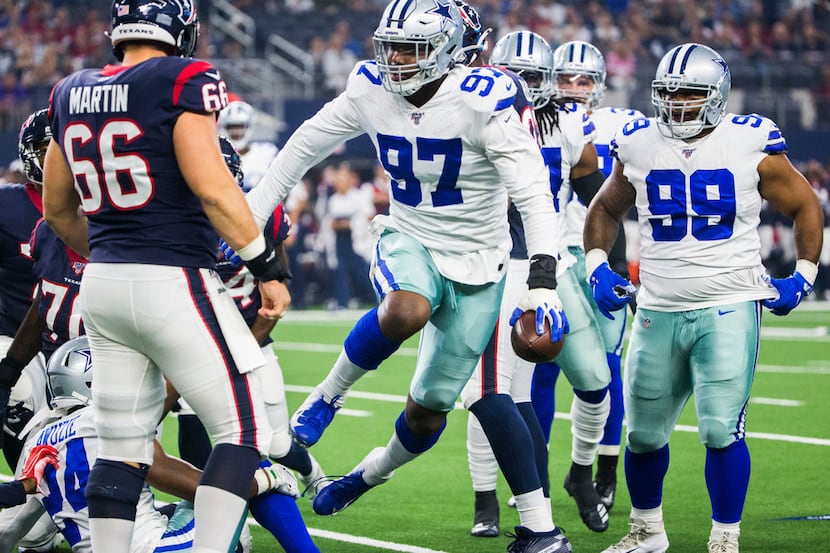 Dallas Cowboys defensive end Taco Charlton (97) celebrates after recovering a fumble after...