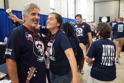 James Barrera, left, and his daughter Cherish Maldonado Barrera celebrate backstage after...