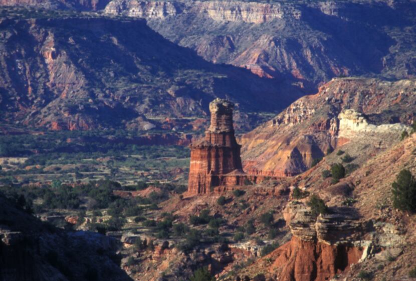 Lighthouse Rock stands amid the fantastic landscape of Palo Duro Canyon.