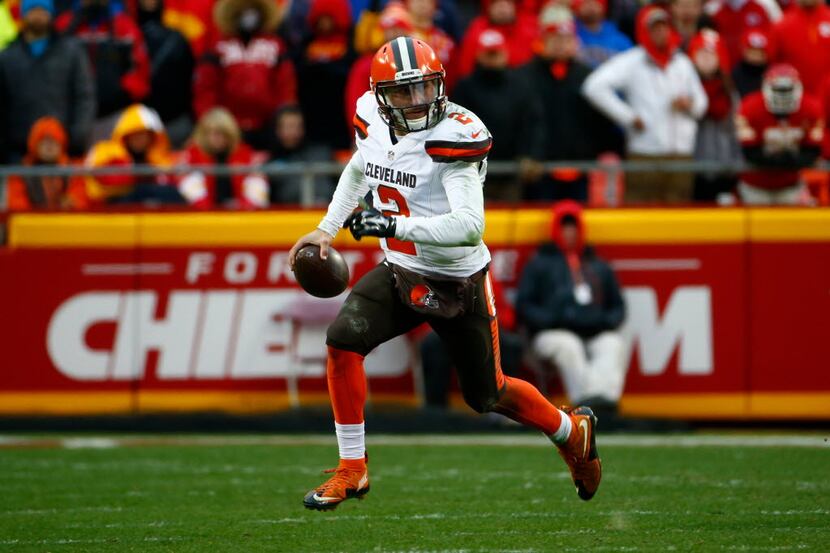 KANSAS CITY, MO - DECEMBER 27:  Johnny Manziel #2 of the Cleveland Browns rolls out of the...