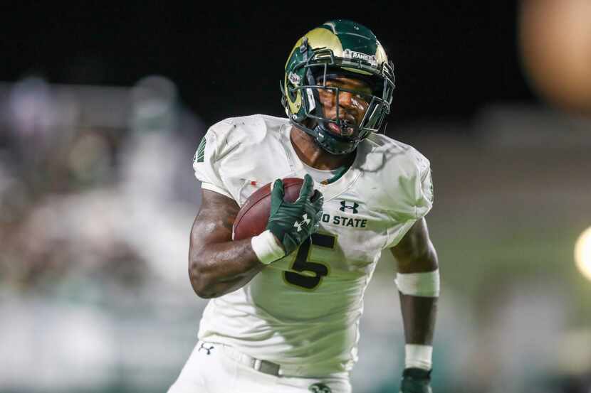 Colorado State running back David Bailey (5) runs the ball during the second half of an NCAA...