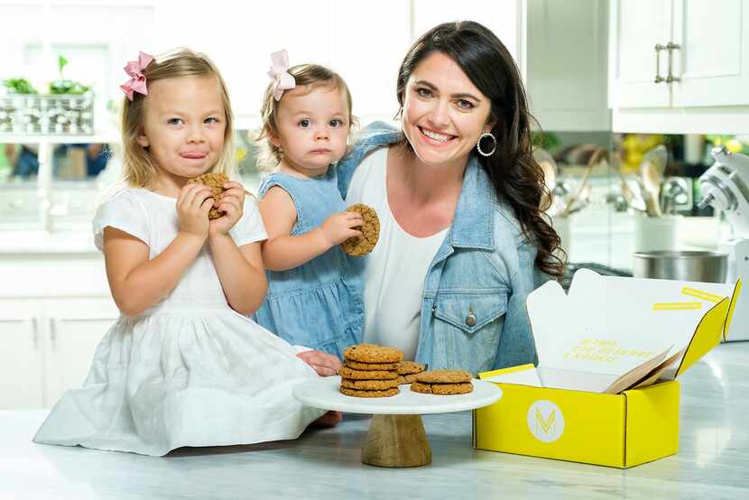 Whitney Rowell photographed with her daughters Stella, 3, and Charlotte, 1, and a plate of...