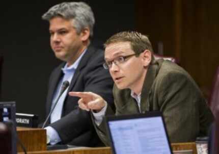  DISD Trustee District 2 Mike Morath, right, asks a question at a trustee meeting.  (2015...