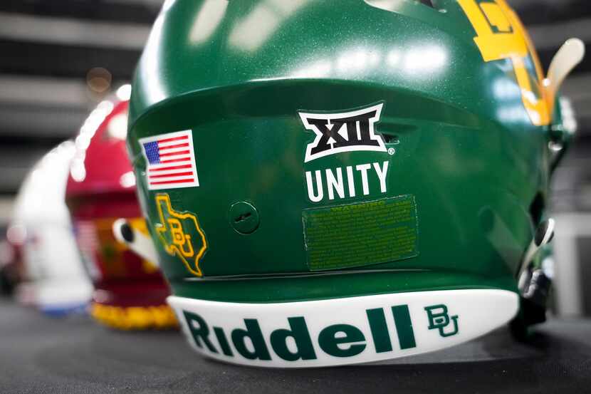 A sticker reads “unity” under the Big 12 logo on a Baylor helmet displayed during the Big 12...