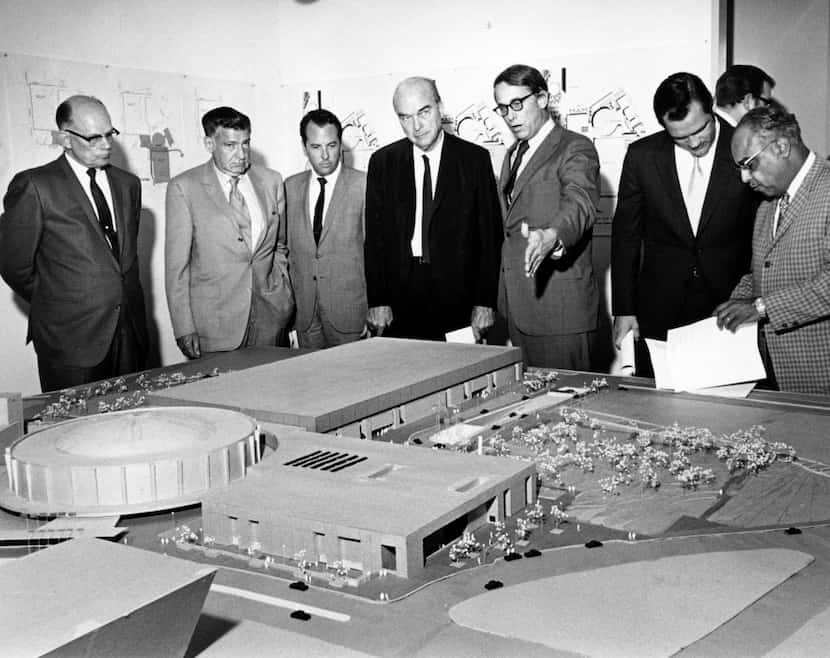 In 1969, Dallas Mayor J. Erik Jonsson (center) and architect E. G. Hamilton (to Jonsson's...