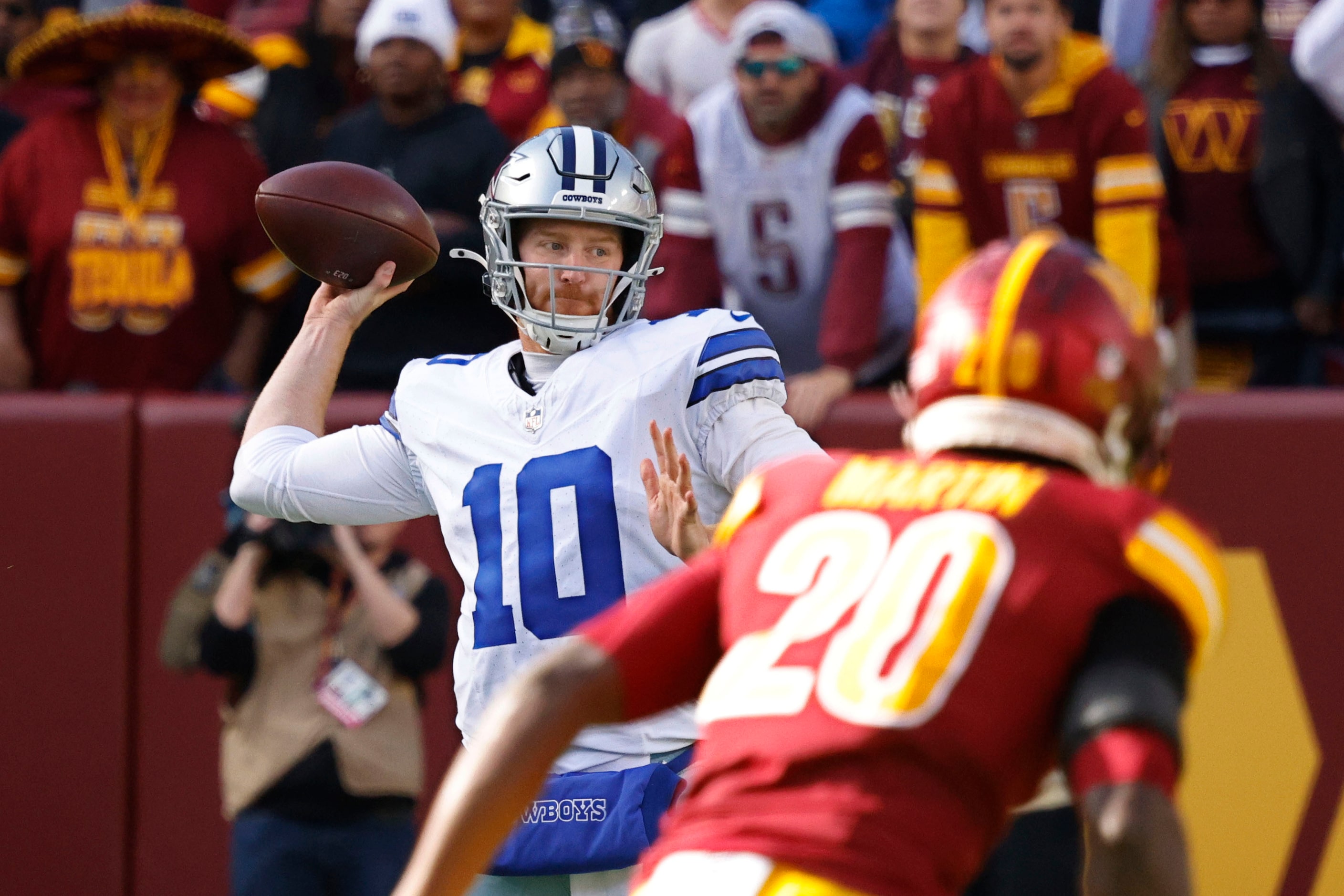 Dallas Cowboys quarterback Cooper Rush (10) passes against Washington Commanders safety Quan...