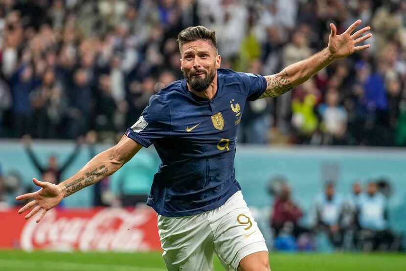 France's Olivier Giroud celebrates after scoring his side's second goal during the World Cup...