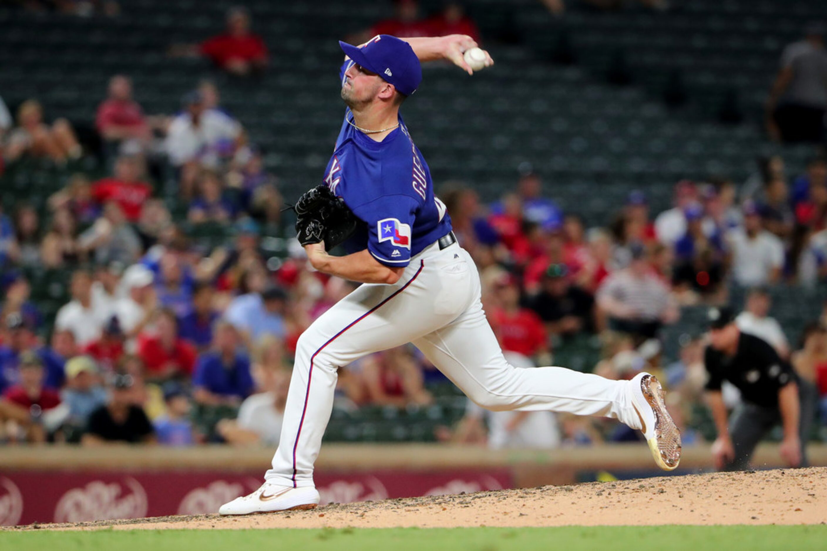 ARLINGTON, TEXAS - JULY 16: Taylor Guerrieri #46 of the Texas Rangers pitches against the...