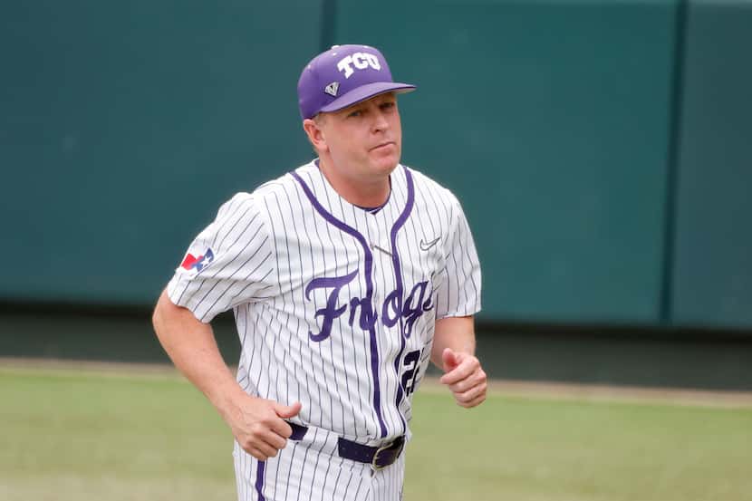 TCU baseball coach Jim Schlossnagle walks off the field prior to playing Oregon St. during...