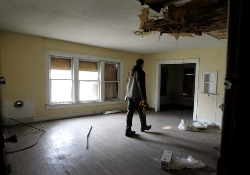 Randy Johnson walks through the apartment where Lee Harvey Oswald once lived at 600 Elsbeth...