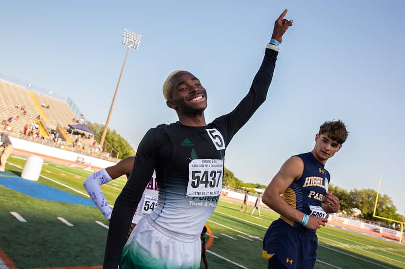 Kendrick Smallwood of Mesquite Poteet celebrates after placing in the 5A boys 300m hurdles...