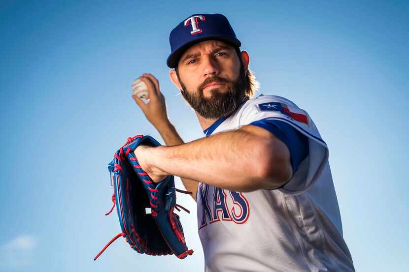Texas Rangers pitcher Jason Hammel poses for a photograph during spring training photo day...