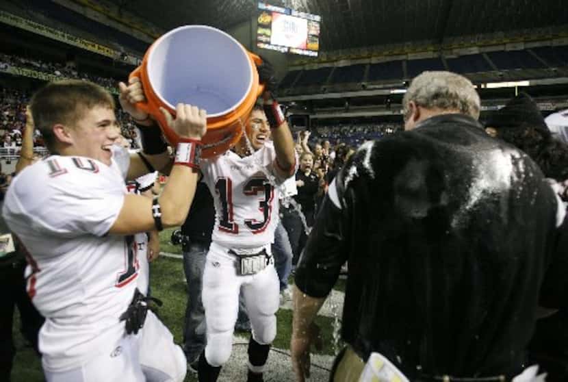  12/22/07---Euless Trinity wide receivers Stetson Smith (10) and Justin Runningdeer (13)...