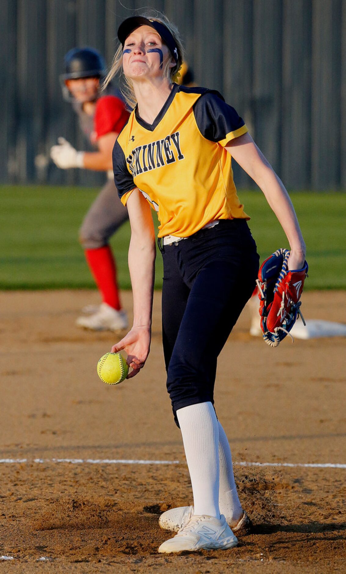 McKinney High School pitcher Jo Cabana (2) delivers a pitch with a runner at second base...