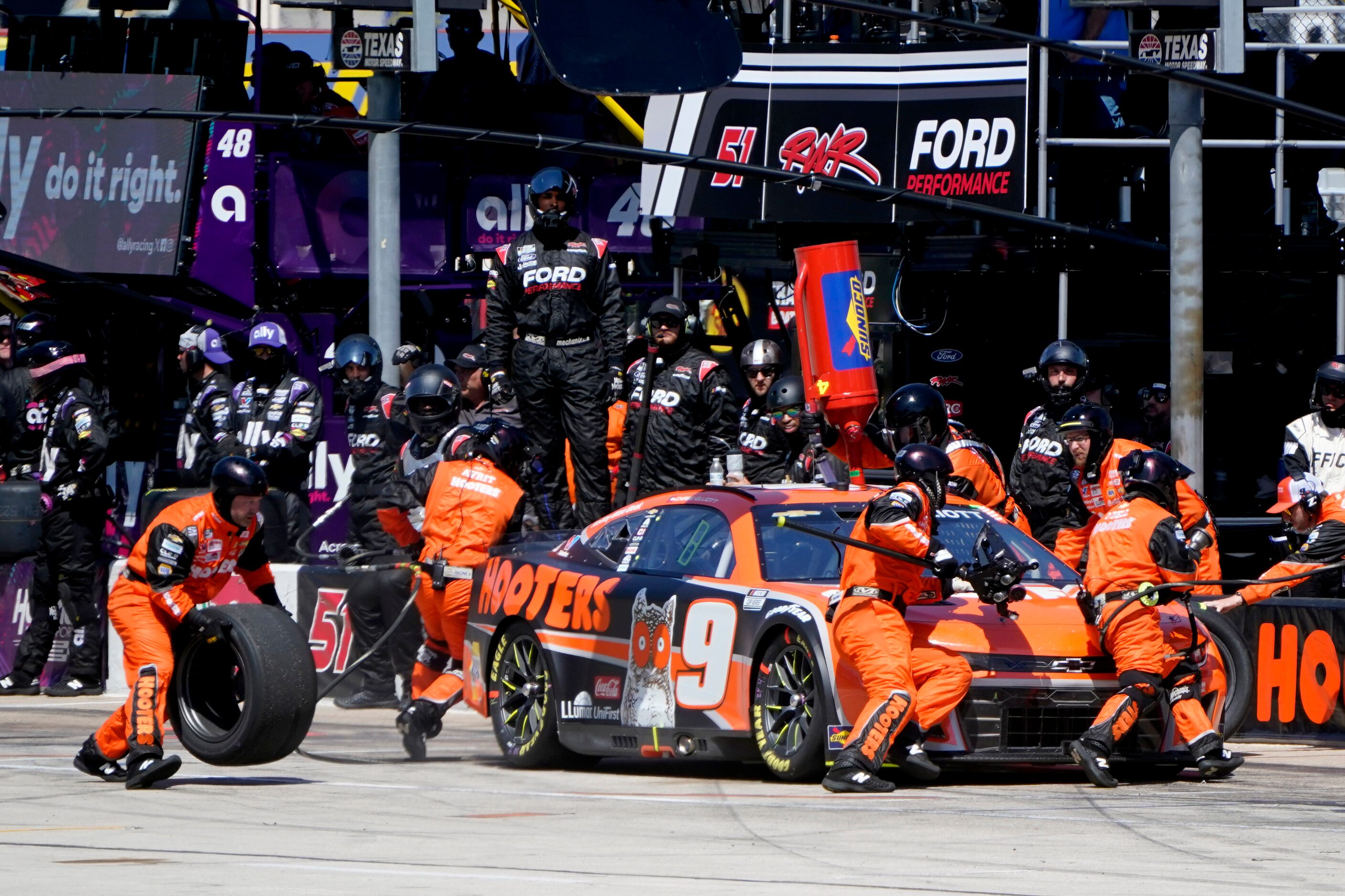 Chase Elliott pits during a NASCAR Cup Series auto race at Texas Motor Speedway in Fort...