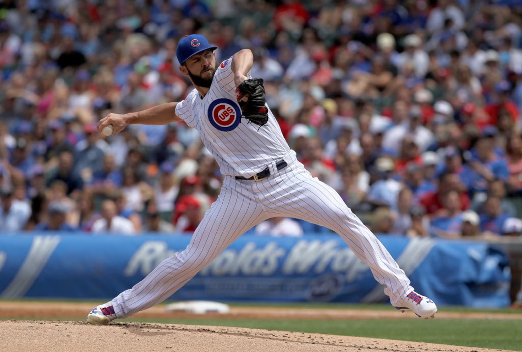 Arrieta loses bet on CWS, to gain tattoo