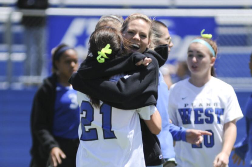 Plano West celebrates after a 3-0 win at the UIL class 5A girls soccer state semifinal...