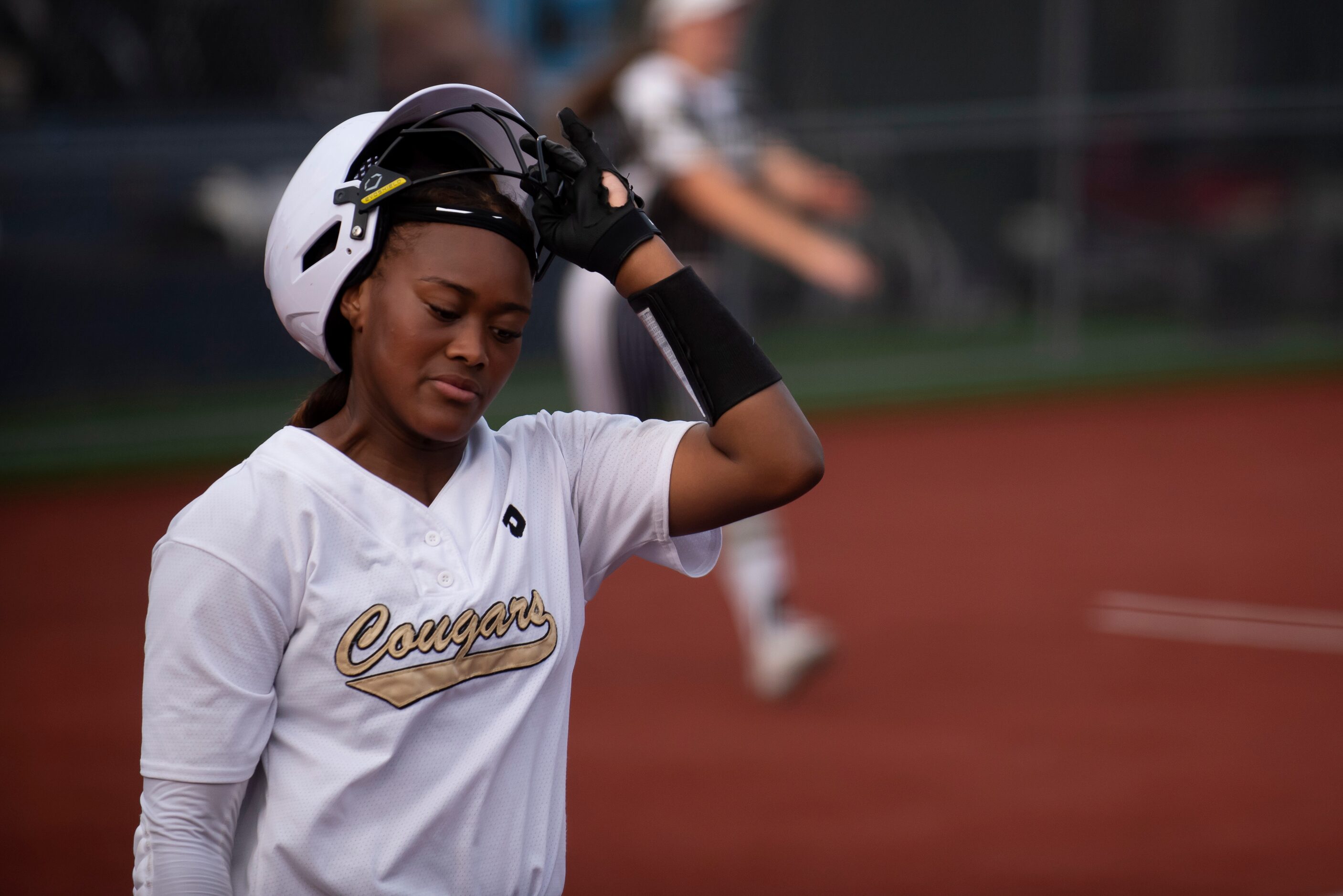 The Colony’s Tamya Waiters (24) takes off her helmet after striking out during game two of...