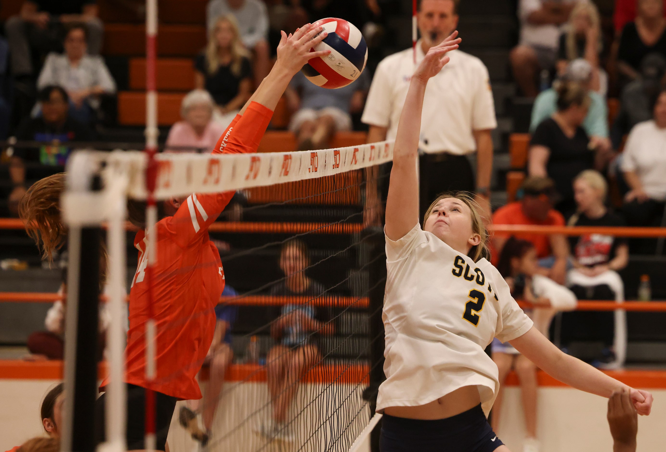 Rockwall High School’s Ava Weigand hits the ball past Highland Park High School’s Harper...