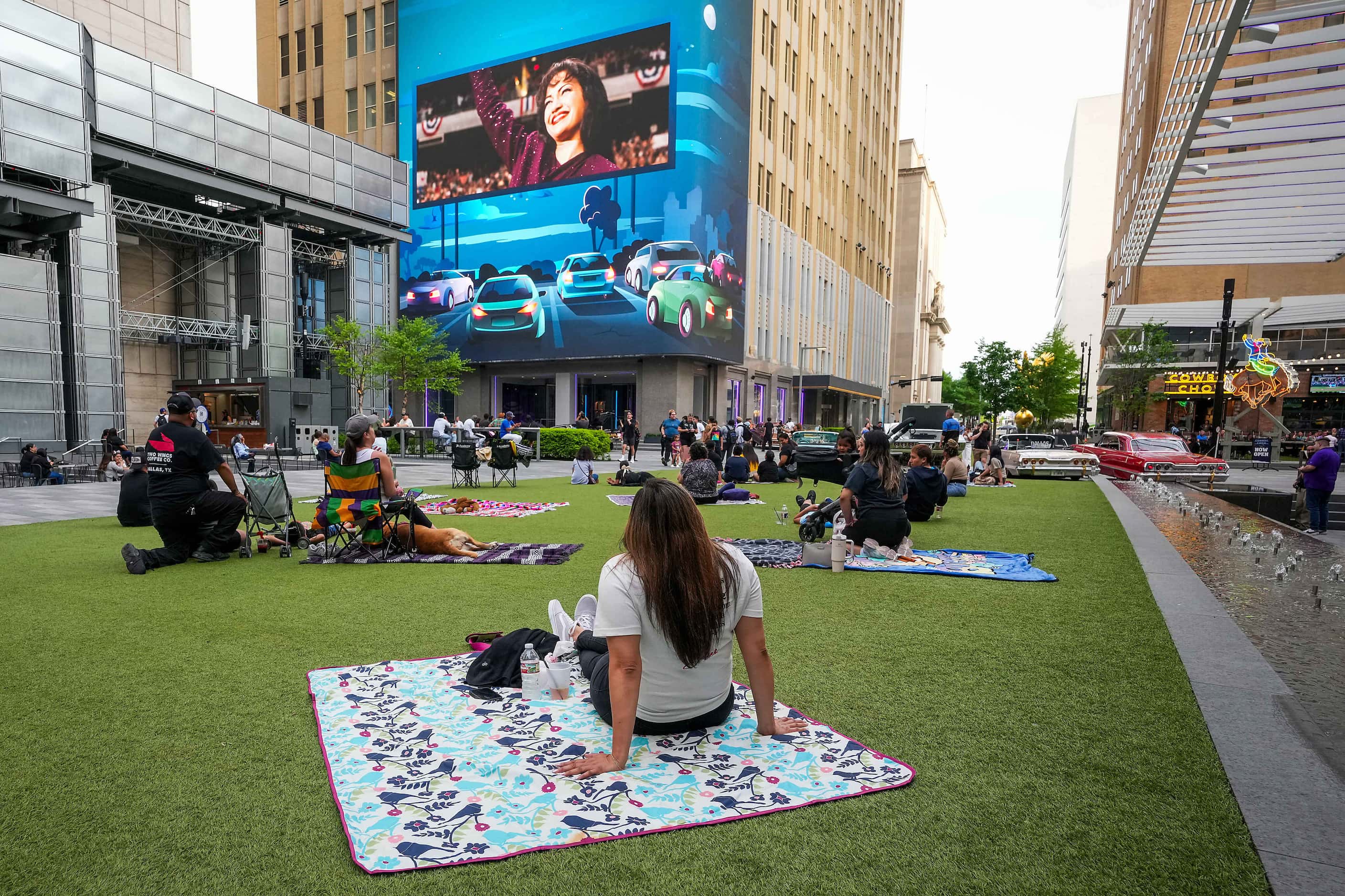 People spread out on the lawn to watch a  screening of the 1997 film starring Jennifer Lopez...
