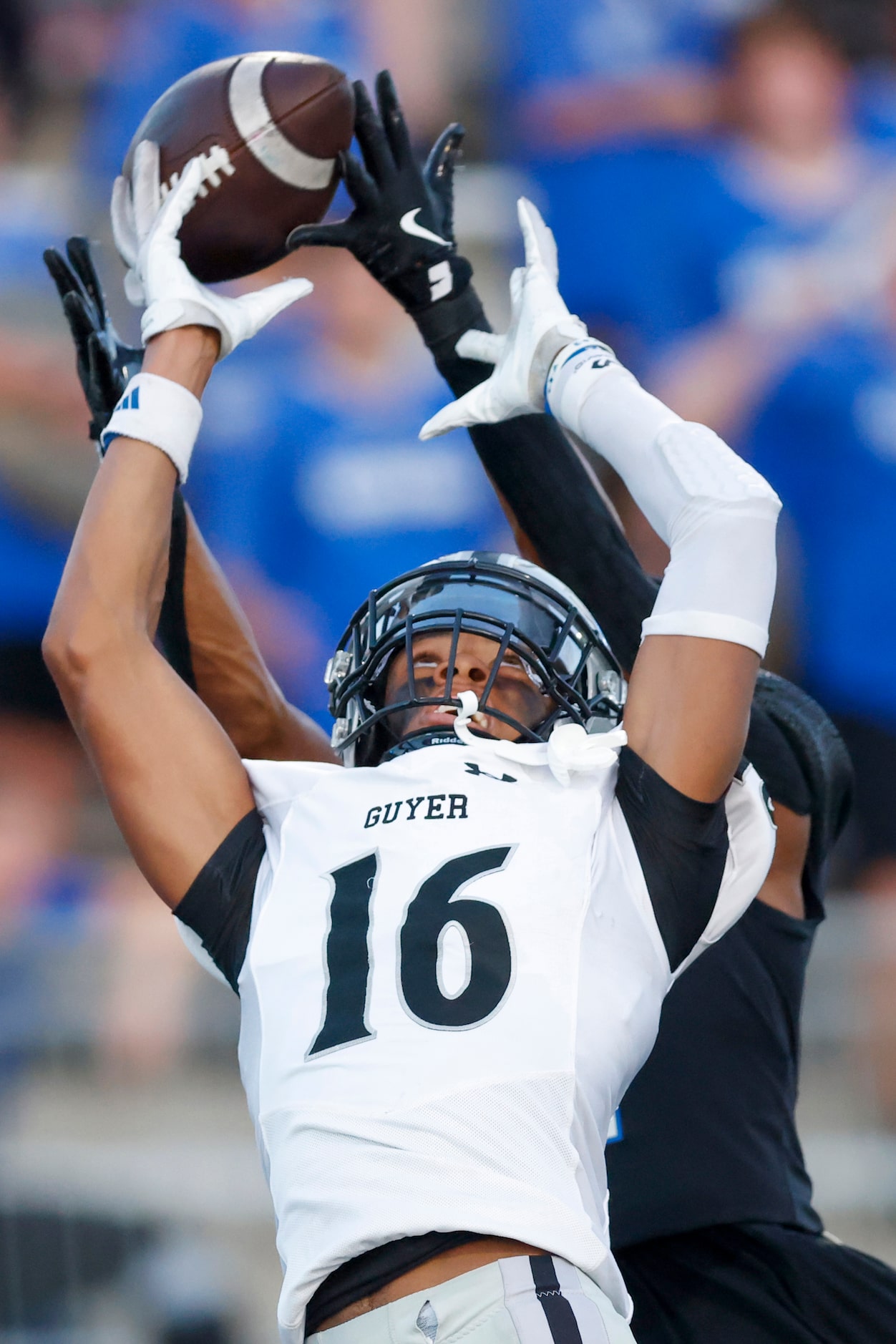 North Crowley defensive back Draden Fullbright (4) breaks up a pass intended for Denton...