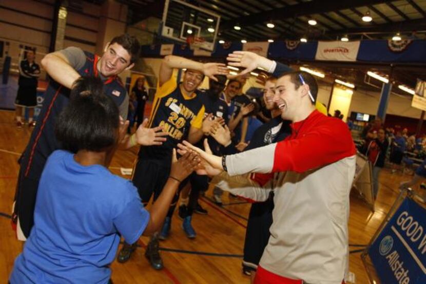 MEMBERS OF  the Allstate NABC Good Works Team served as role models for the Special Olympians.
