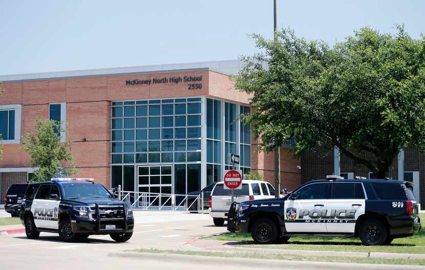 McKinney police outside McKinney North High School during a lockdown at the school in...