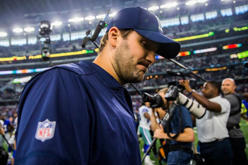 Dallas Cowboys quarterback Tony Romo (9) walks off the field after a 20-19 loss to the New...