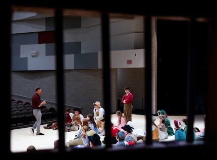 Theatre/artistic director Kyle Nichols leads a group talk  with the cast members ahead of a...