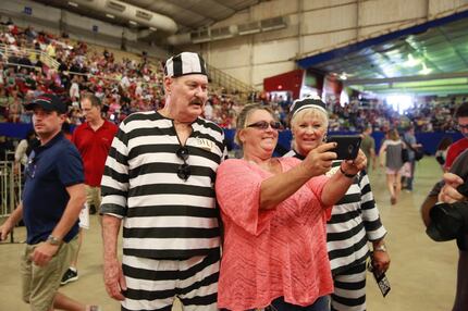 Carlette Duperior, center, of San Antonio takes a photo with Dan, left, and Jeanne McNeil,...