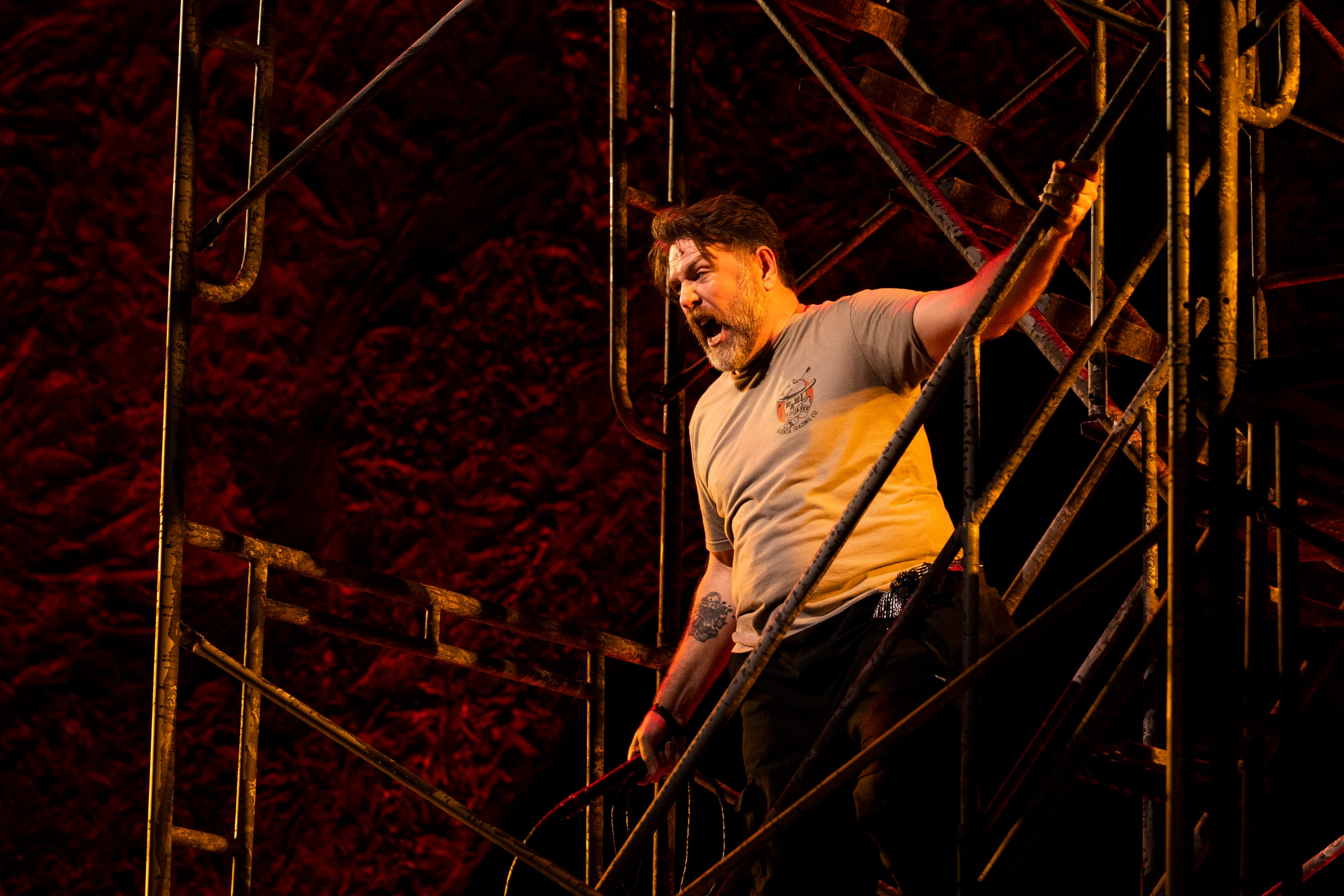 Baritone Michael Mayes performs during staging rehearsal on a scaffolding made by Dallas...