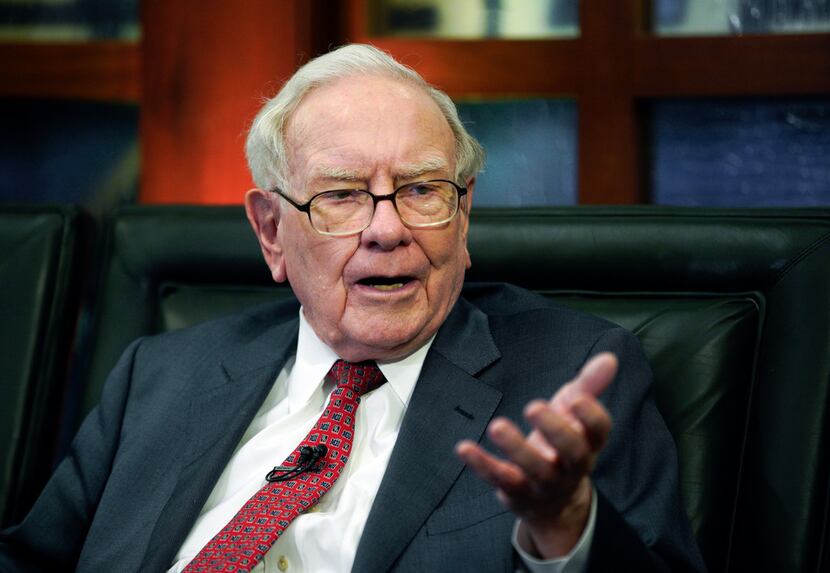 Berkshire Hathaway Chairman and CEO Warren Buffett says Apple's iPhone is "enormously...