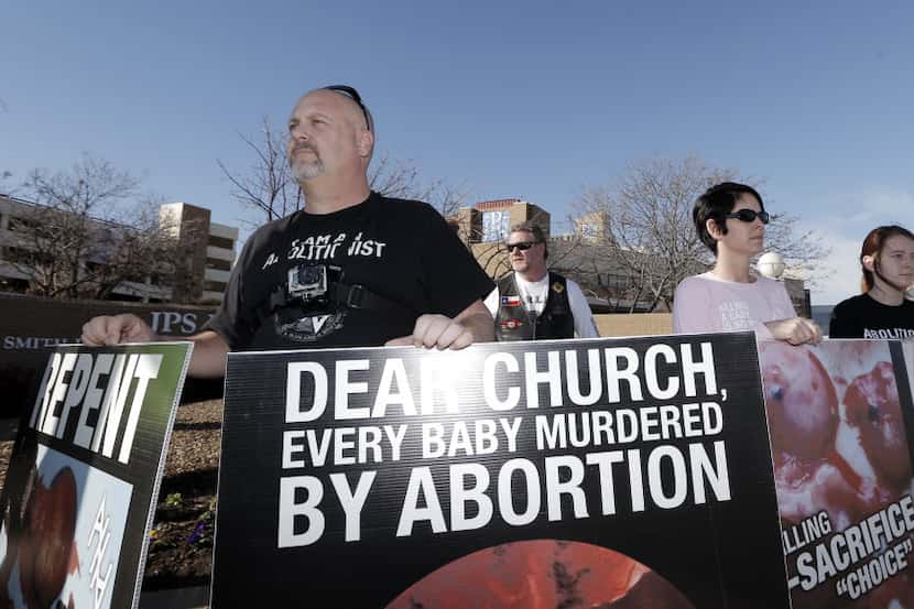 Protesters from Abolish Human Abortion participate in a rally in 2014. 