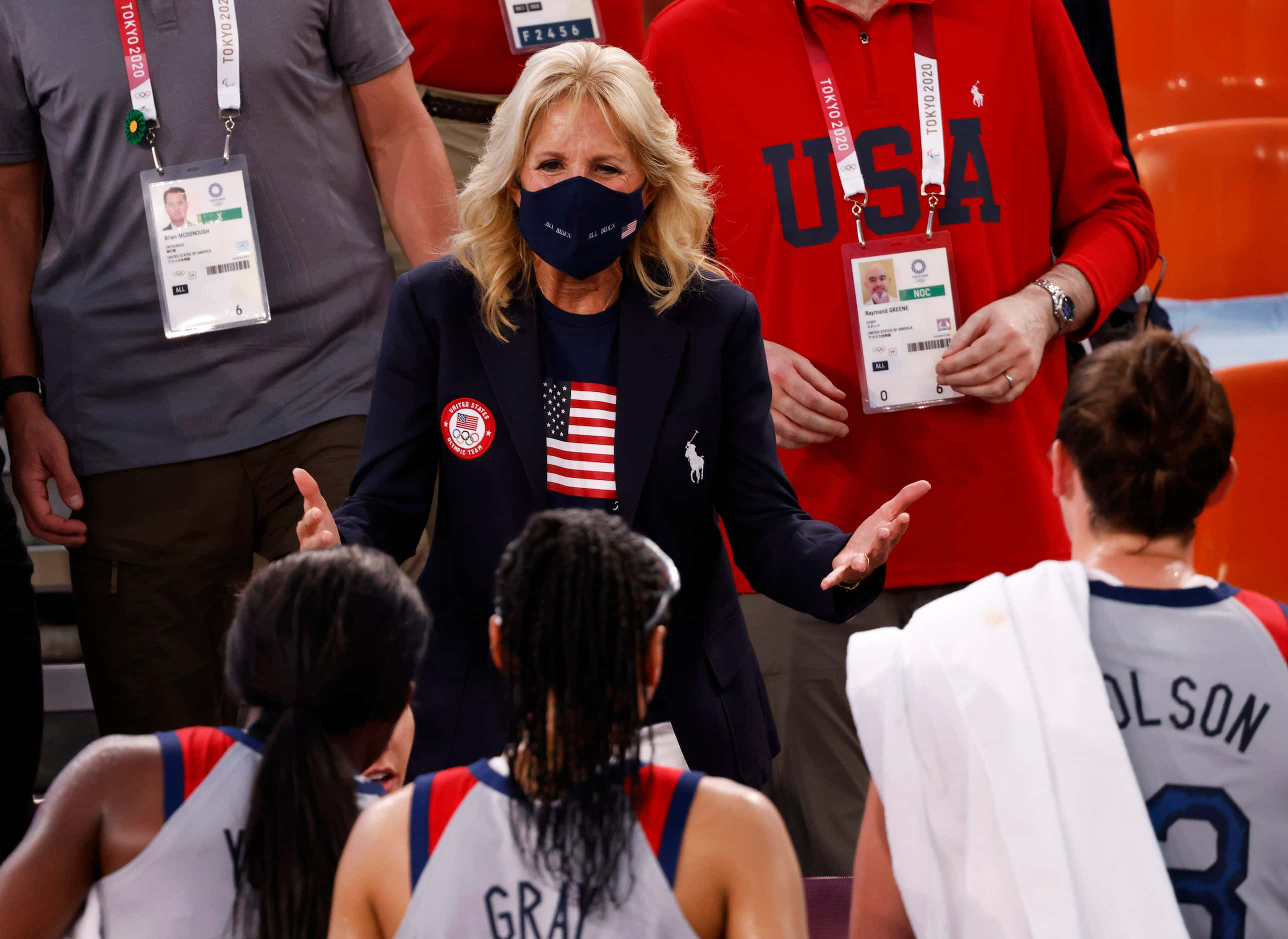 First lady Jill Biden talks with USA players after their victory over France 17-10 in a 3x3...