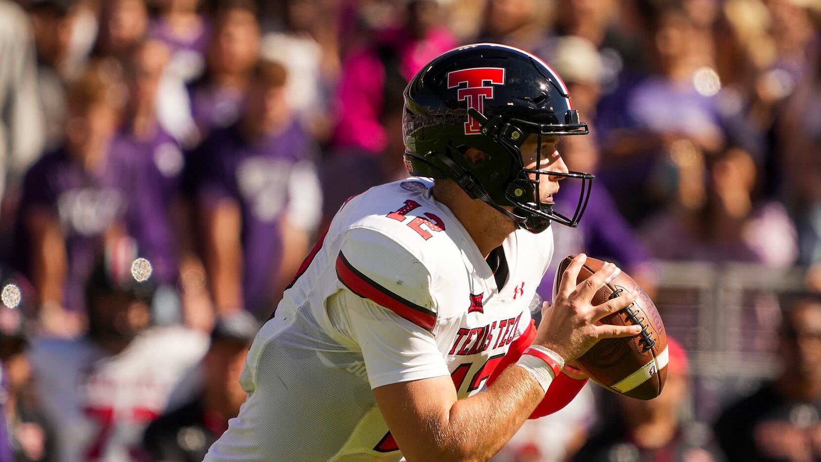 Texas Tech quarterback Tyler Shough (12) looks to pass during the second half of an NCAA...