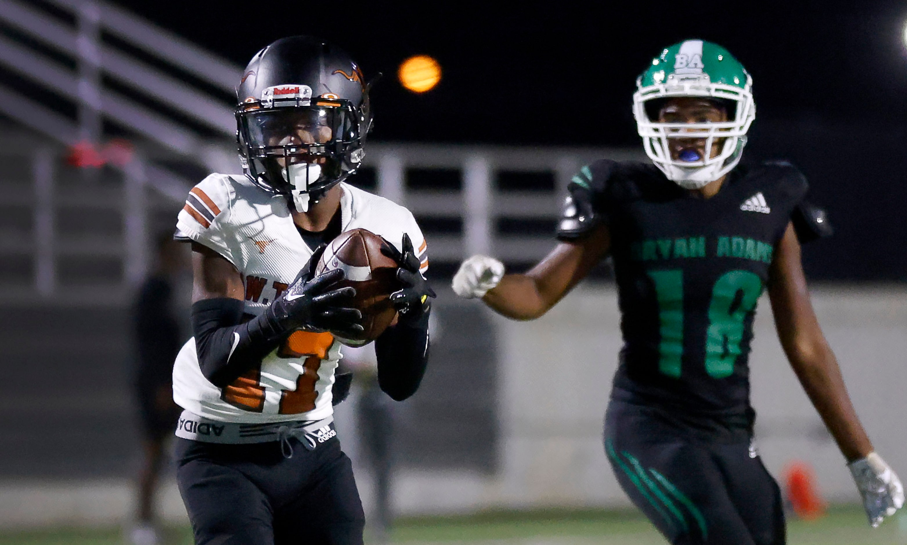 W.T. White wide receiver Bralon Beasley (17) catches a late second quarter pas he ran in for...