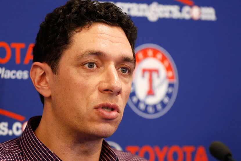 FILE - Rangers general manager Jon Daniels answers questions during a press conference at...