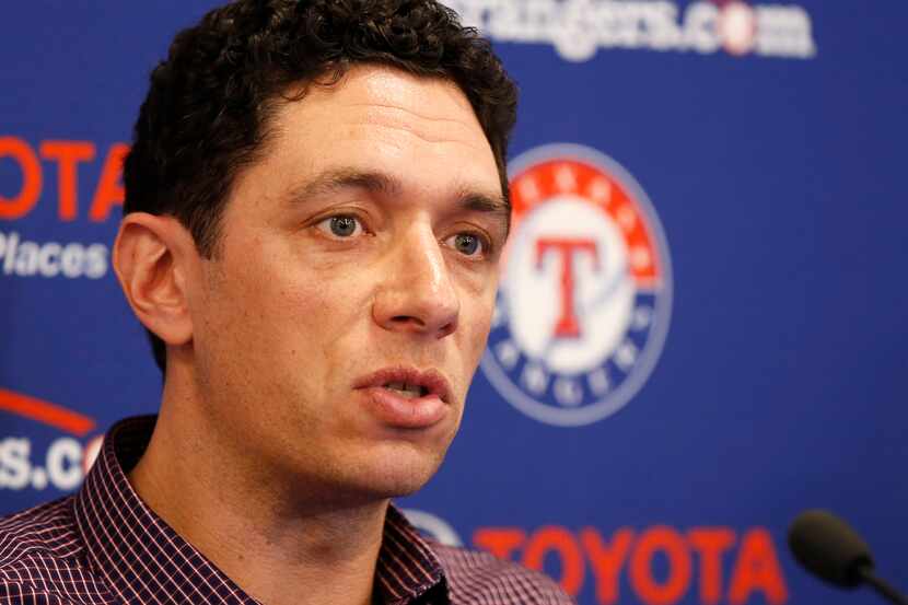 Texas Rangers general manager Jon Daniels answers questions during a press conference at...