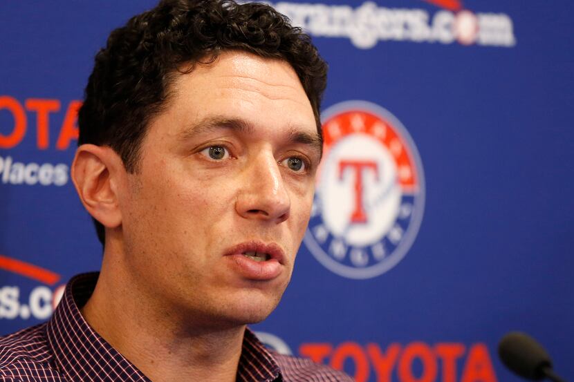 Texas Rangers general manager Jon Daniels answers questions during a press conference at...