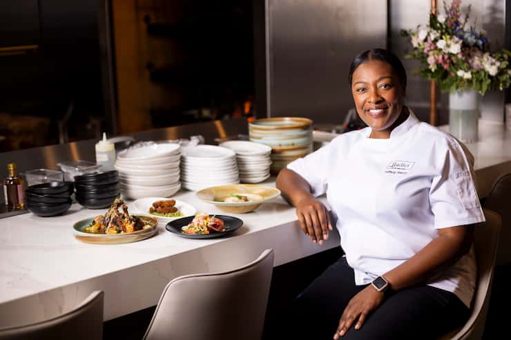 Celebrity chef Tiffany Derry poses at the counter of her new Italian restaurant, Radici, on...