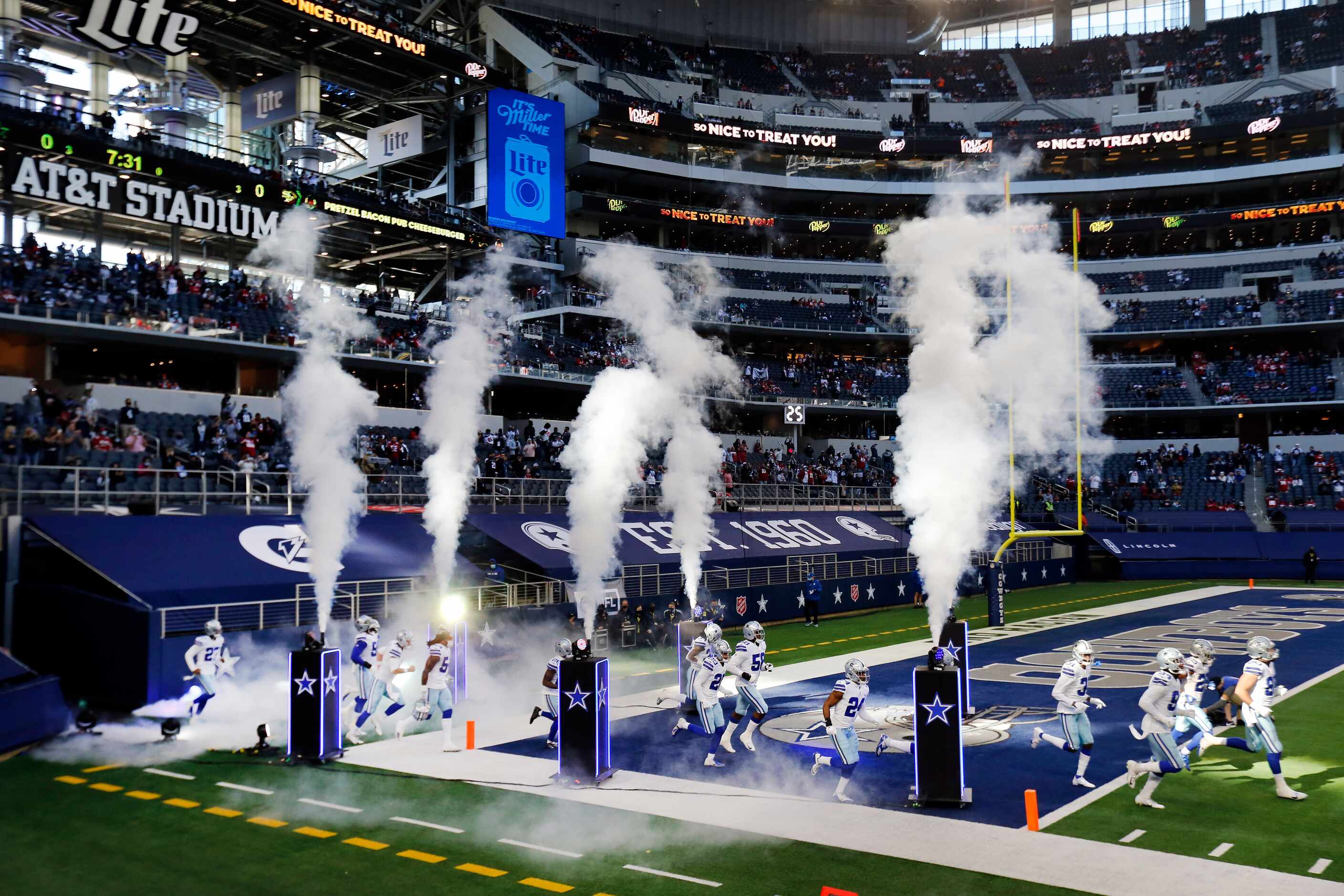 The Dallas Cowboys football team takes the field to face the San Francisco 49ers at AT&T...