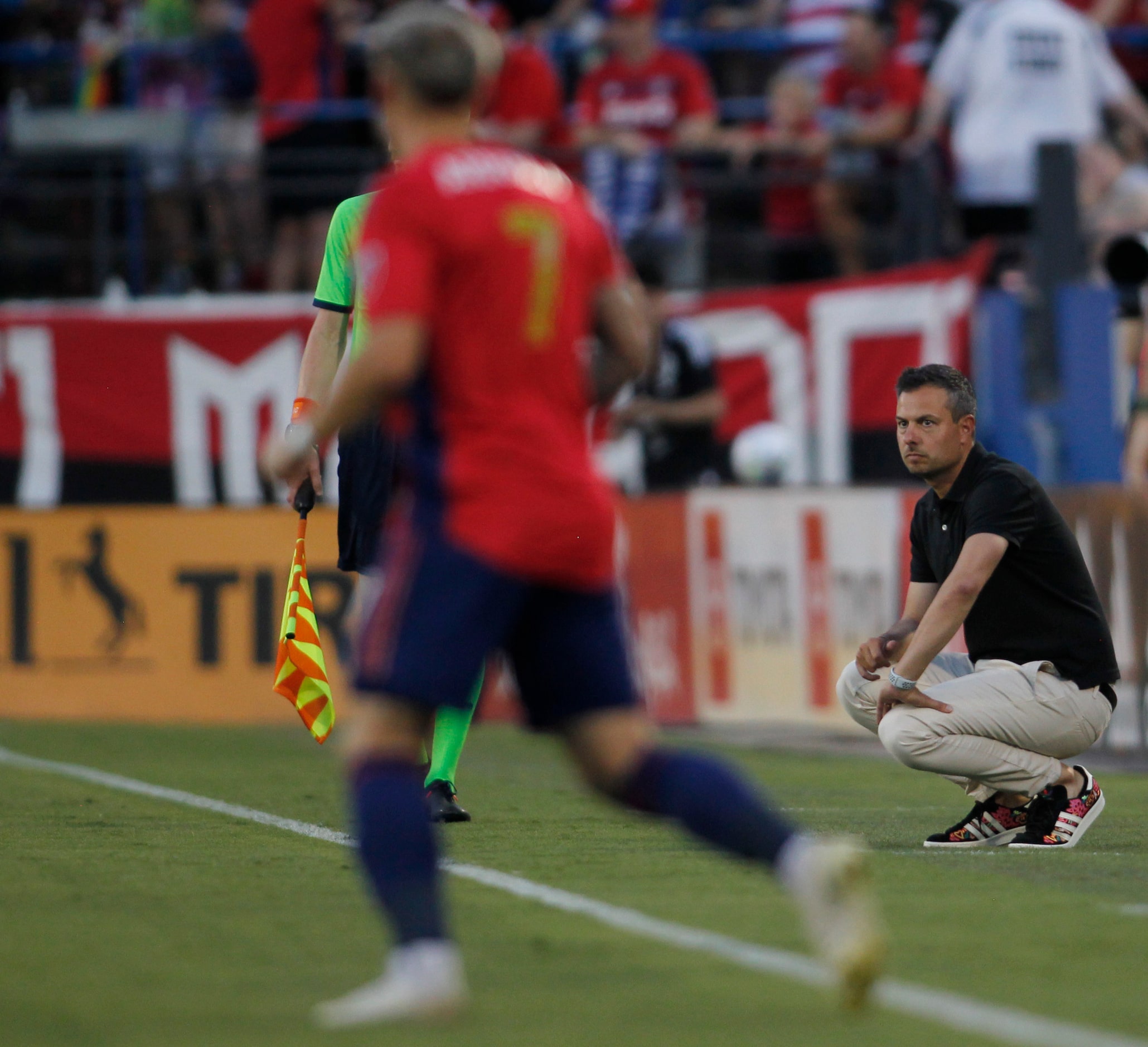 FC Dallas head coach Nico Estevez watches first half action against Vancouver from the team...