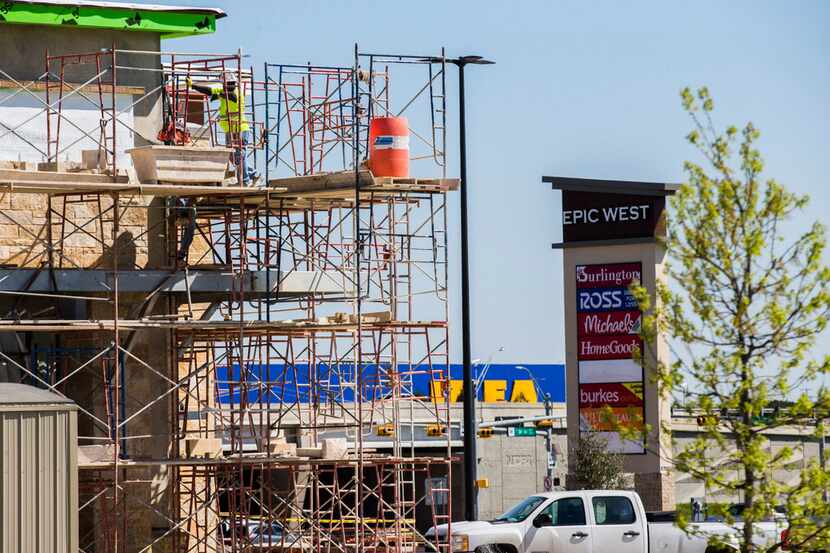 Retail stores were under construction Monday near the new Ikea at the intersection of State...