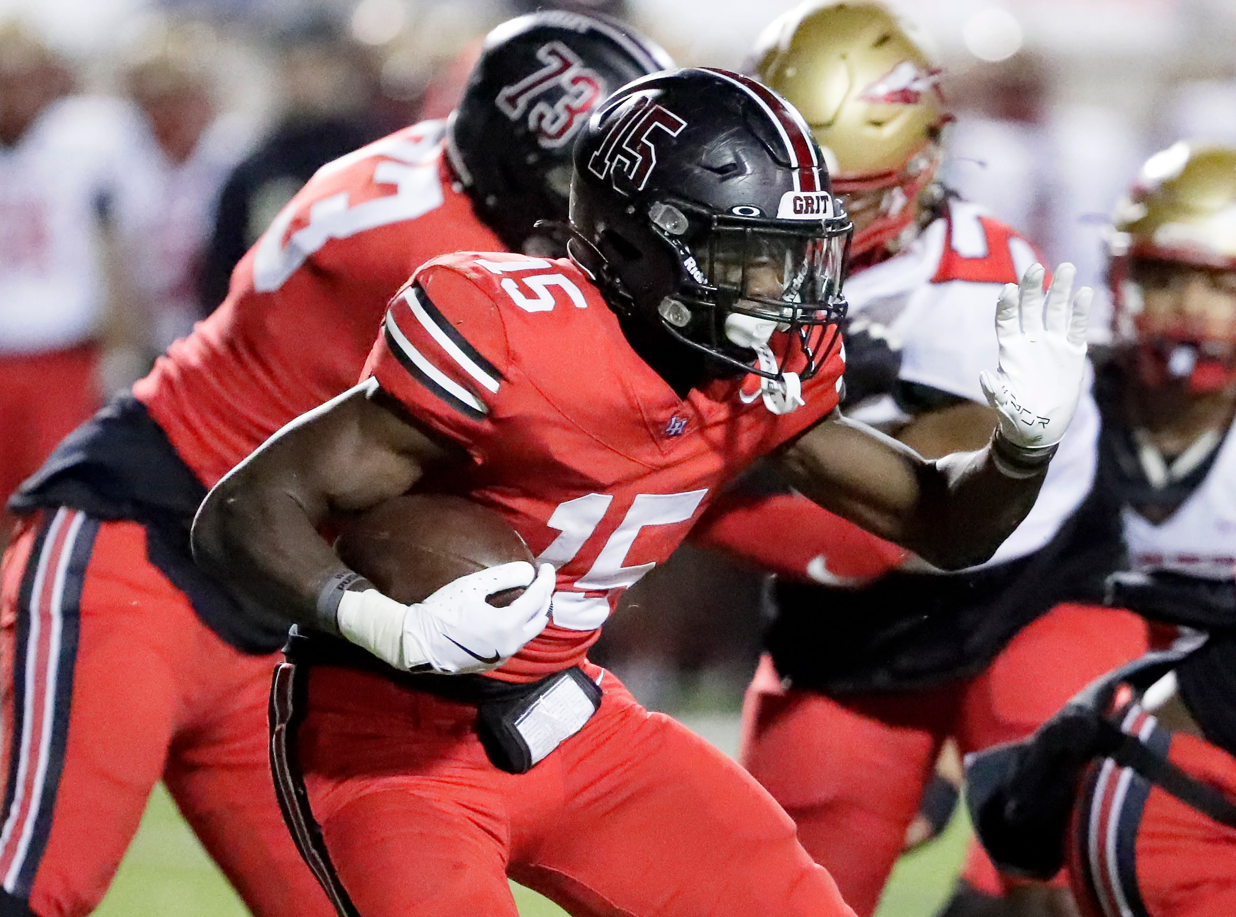 Lake Highlands High School running back Christian Rhodes (15) carries the ball during the...