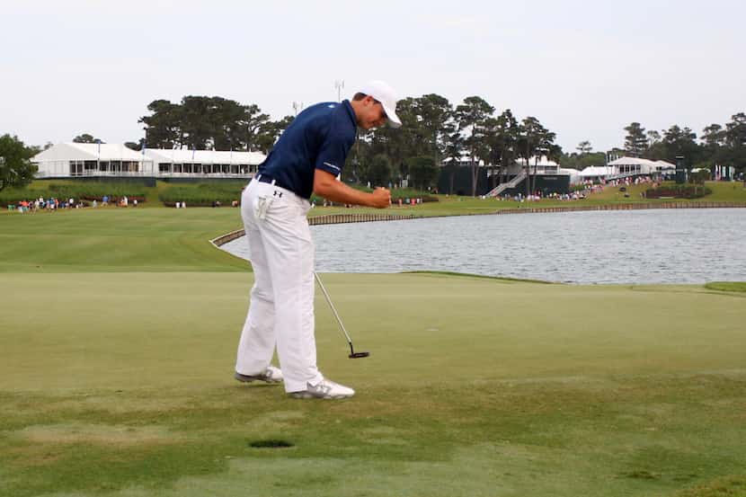 May 10, 2014; Ponte Vedra Beach, FL, USA; Jordan Spieth reacts to making his par putt on the...