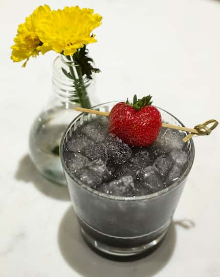 The Black Rose cocktail at Flower Child is mixed with Texas vodka, elderflower, rose petal...