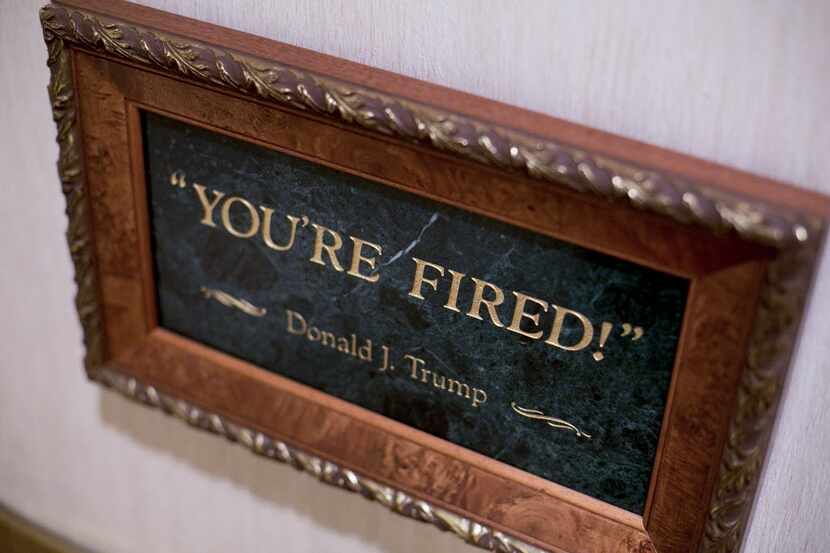 A plaque showing Donald Trump's catch phrase used on NBC's "The Apprentice," at Trump...