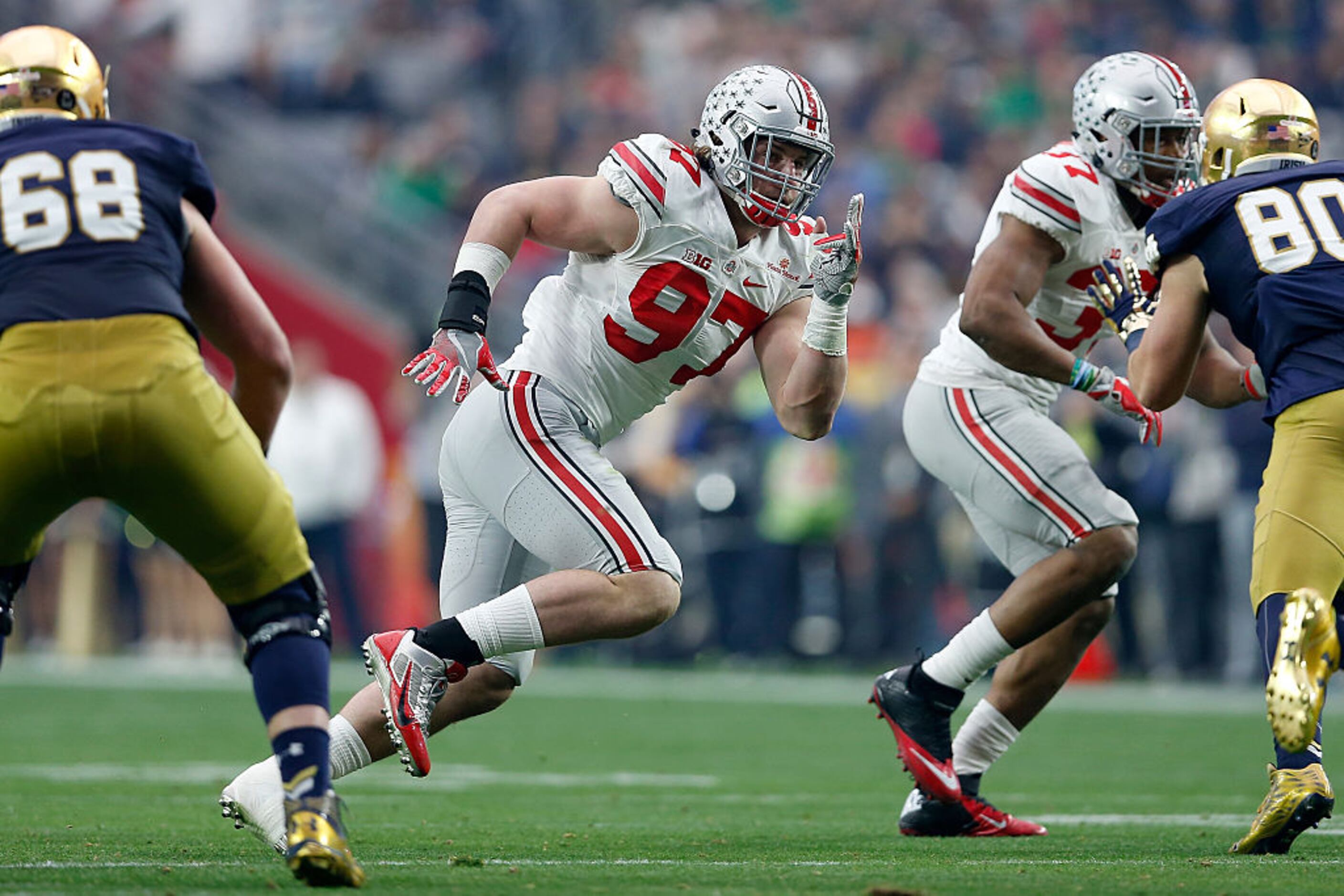 Joey Bosa leaves game, college career early in Ohio State's Fiesta