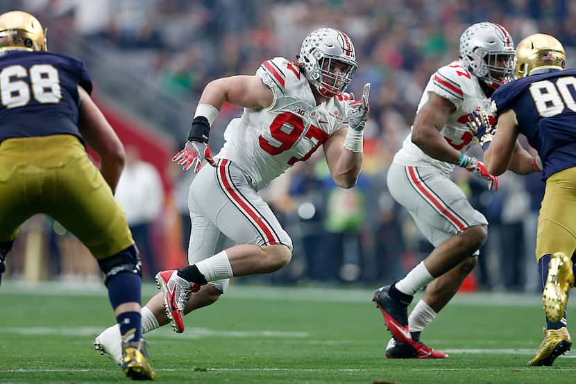 Defensive lineman Joey Bosa #97 of the Ohio State Buckeyes in action during the BattleFrog...